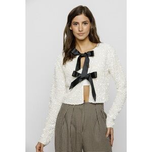 Storia White Sequin Textured Tie Top with Black Bow